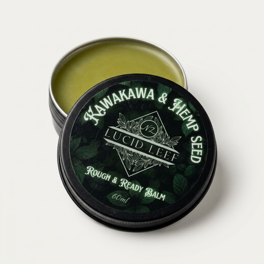 A tin of Lucid Leef Kawakawa and Hemp Seed Balm sitting on a stark white studio background.